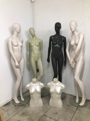 three mannequins that are standing next to each other