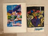 Deux tableaux sont accrochés au mur : l'un représente une ville et l'autre un bâtiment.