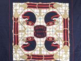 an image of a scarf with a picture of two birds on it
