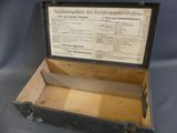 an old wooden box that is open on a table