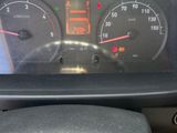 a close up of a car dashboard with a speedometer