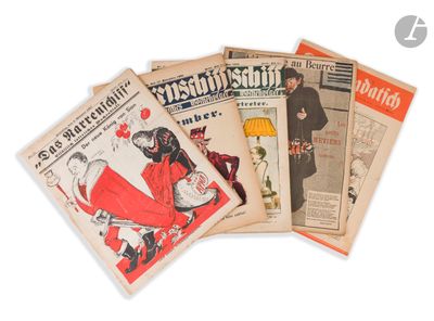 a lot of newspapers that are sitting on a table