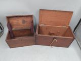 two wooden boxes sitting next to each other on the floor