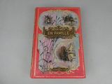 a pink book with a picture of a cat and a mouse on it