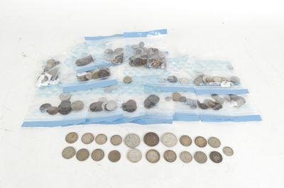 a lot of coins in the bag on the table