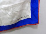 a white and blue handkerchief with an elephant on it