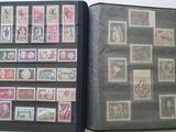 a lot of stamps on the pages of a book