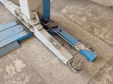 an image of a fork lift in a garage
