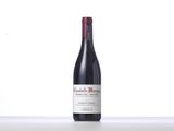 a bottle of red wine sitting on top of a counter