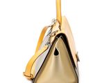 yellow and black handbag on a white background with a strap