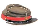 a brown hat with a red band on it