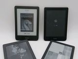 three kindle books are sitting next to each other on a table