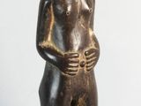an image of a statue of a man with a hat on his head