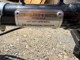 a sign on the handlebar of a motorcycle that says trailers moto