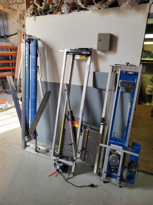 a room that has a bunch of tools on the wall