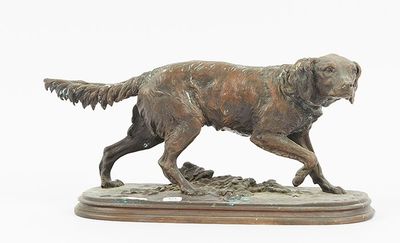 bronze statue of a dog on a wooden base on a white background