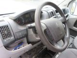 dashboard of a car with a steering wheel and dashboard controls