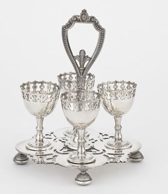 an image of a silver plate with three wine glasses on it