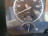 a close up of a car dashboard with a speedometer