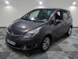 a picture of a grey opel parked in a garage