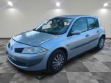 a picture of a blue car parked in a garage