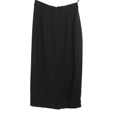 a black skirt on a hanger on a white background