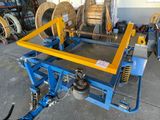 a picture of a machine that is sitting in a garage
