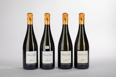 trois bouteilles de vin posées sur une table