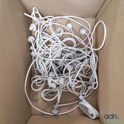 a box with a bunch of wires and cords in it