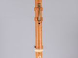 an image of a wooden pipe with a metal handle