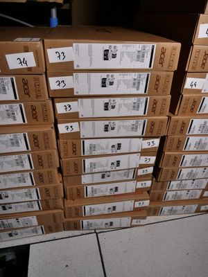 a lot of boxes stacked on top of each other on the floor