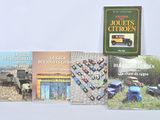 a lot of books that are sitting on a table