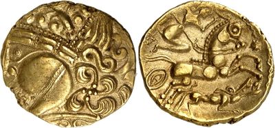 a gold coin with an image of a man riding a horse