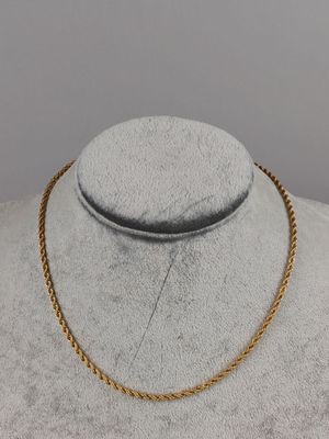 a gold rope necklace on a mannequin mannequin mannequin mannequin mannequin mannequin mannequin mannequin manne