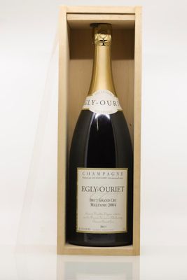 an image of a bottle of champagne in a wooden box