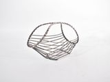 silver wire basket on a white background