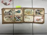 an old book with pictures of people and animals on it