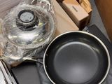 a frying pan and a frying pan on a table