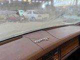 a dashboard of a car that has a sticker on it