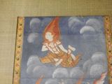 a picture of a painting of a person on a flying object