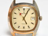 an image of a close up of a wrist watch on a white surface