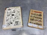two comics on the table next to each other
