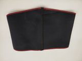 a close up of a black and red belt with a zipper