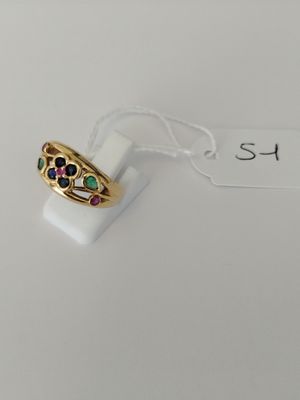 a close up of a ring on a white surface with a price tag