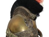 a helmet with a fur ball on top of it