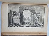 an old book with a drawing of a roman arch in the middle of it