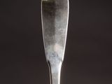 a fork that is sitting on top of a plate