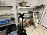 a room with shelves and shelves filled with items