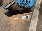 a box that has a phone in it on the ground