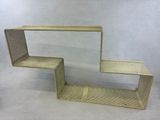 a small wooden shelf with a shelf on top of it